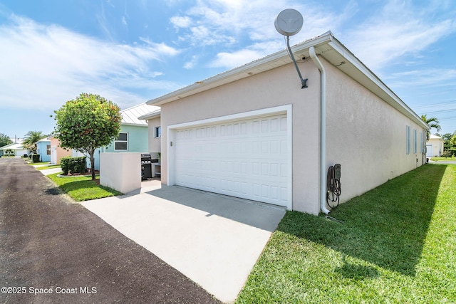 508 Lorelei Ave, Melbourne, FL 32901 - view of side of home with stucco siding, a yard, concrete driveway, metal roof, and a standing seam roof
