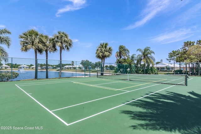 508 Lorelei Ave, Melbourne, FL 32901 - view of tennis court with fence, a water view, and community basketball court