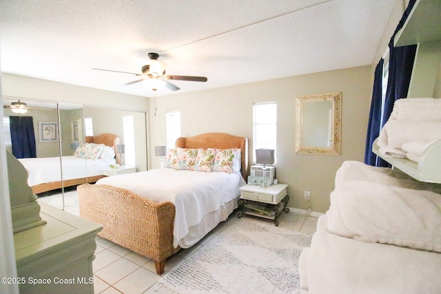 311 Clayton Ave, Melbourne, FL 32901 - bedroom featuring light tile patterned floors, a closet, and ceiling fan