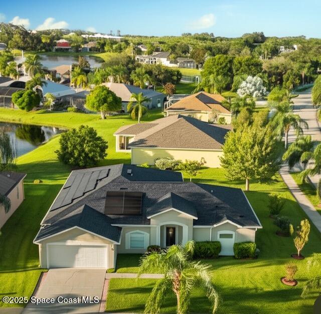 1932 Laramie Cir, Melbourne, FL 32940 - aerial view of residential area with a large body of water