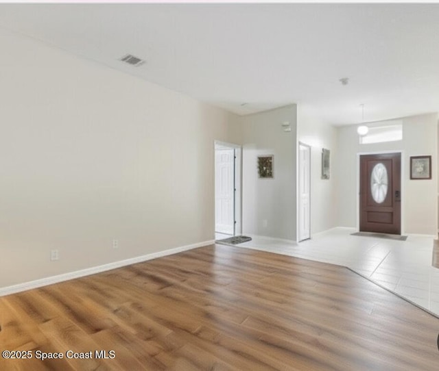 1932 Laramie Cir, Melbourne, FL 32940 - foyer featuring wood finished floors and baseboards