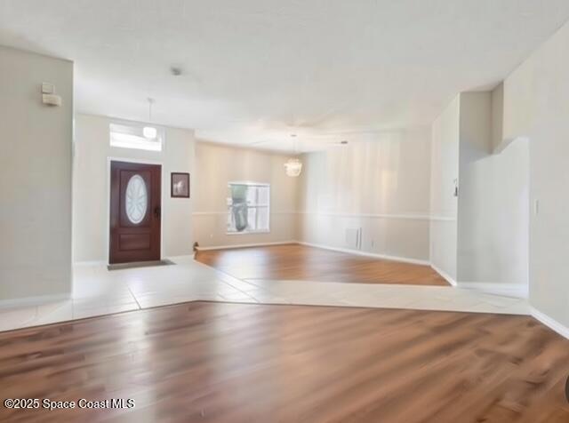 1932 Laramie Cir, Melbourne, FL 32940 - entrance foyer featuring wood finished floors and baseboards