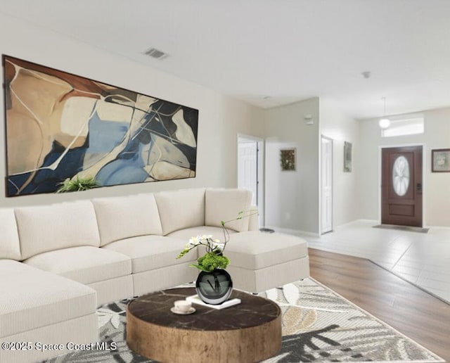 1932 Laramie Cir, Melbourne, FL 32940 - living area featuring wood finished floors and baseboards