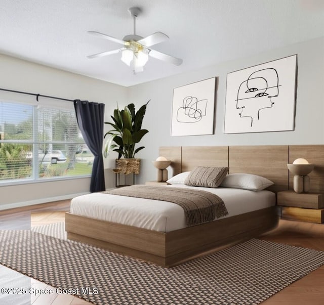 1932 Laramie Cir, Melbourne, FL 32940 - bedroom with wood finished floors and a ceiling fan