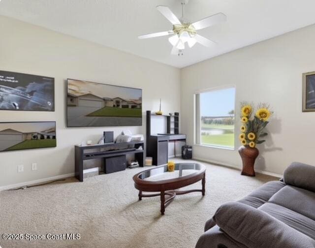 1932 Laramie Cir, Melbourne, FL 32940 - carpeted living room featuring ceiling fan and baseboards