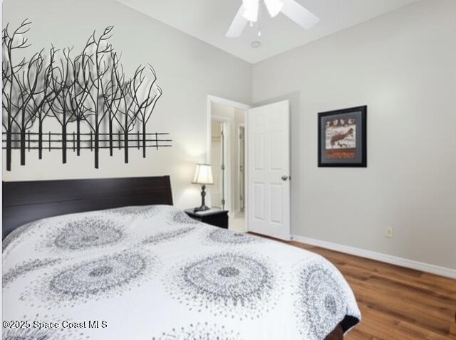 1932 Laramie Cir, Melbourne, FL 32940 - bedroom with wood finished floors, baseboards, and a ceiling fan