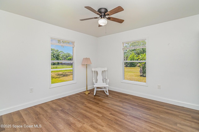 1230 Fern St Unit 1230 & 1232, Cocoa, FL 32922 - unfurnished room with wood finished floors, healthy amount of natural light, and a ceiling fan