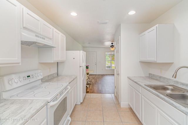 1230 Fern St Unit 1230 & 1232, Cocoa, FL 32922 - kitchen featuring white appliances, under cabinet range hood, white cabinetry, light countertops, and ceiling fan