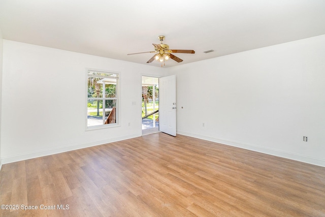 1230 Fern St Unit 1230 & 1232, Cocoa, FL 32922 - spare room featuring light wood-type flooring and a ceiling fan