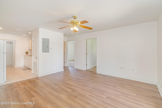 1230 Fern St Unit 1230 & 1232, Cocoa, FL 32922 - spare room with a ceiling fan, electric panel, recessed lighting, and light wood-style floors