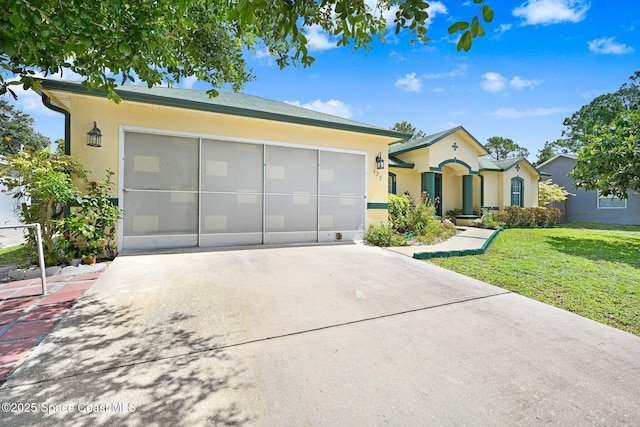 427 Falls Church St SW, Palm Bay, FL 32908 - view of front of property with stucco siding, concrete driveway, a front yard, and a garage