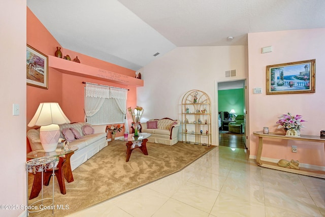 427 Falls Church St SW, Palm Bay, FL 32908 - living room with high vaulted ceiling and baseboards