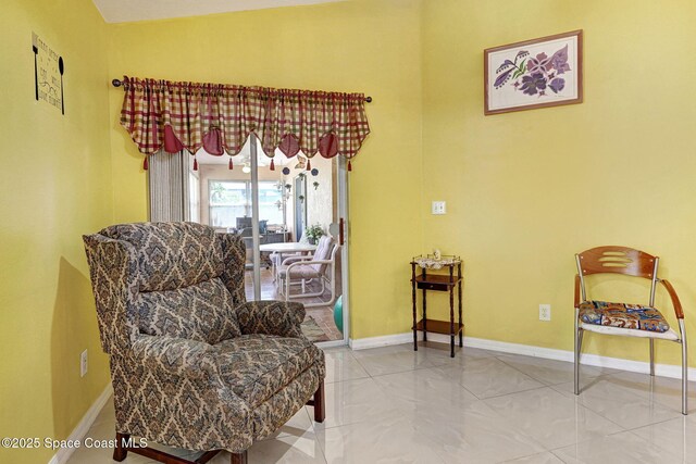427 Falls Church St SW, Palm Bay, FL 32908 - sitting room featuring baseboards