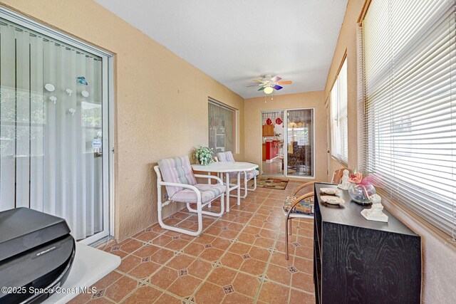 427 Falls Church St SW, Palm Bay, FL 32908 - sunroom / solarium featuring a ceiling fan and tile patterned flooring