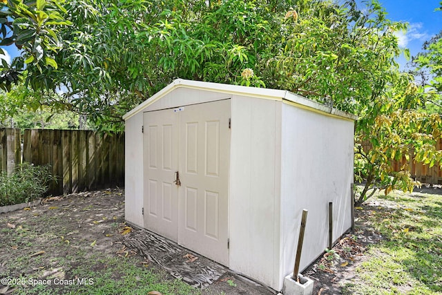 427 Falls Church St SW, Palm Bay, FL 32908 - view of shed with a fenced backyard