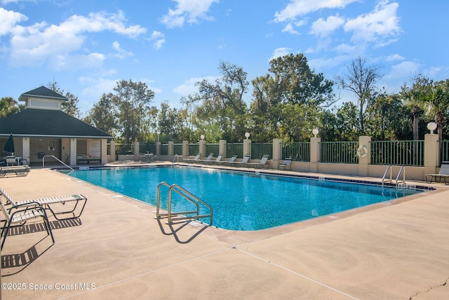 8002 Bradwick Way, Melbourne, FL 32940 - community pool with a patio