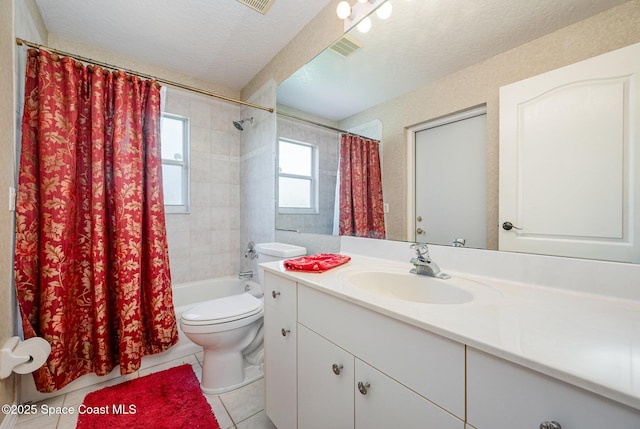 8002 Bradwick Way, Melbourne, FL 32940 - bathroom with toilet, shower / bath combo with shower curtain, vanity, tile patterned flooring, and a textured ceiling