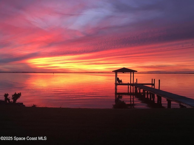 2880 S Atlantic Ave Unit 102, Cocoa Beach, FL 32931 - dock with boat lift and a water view