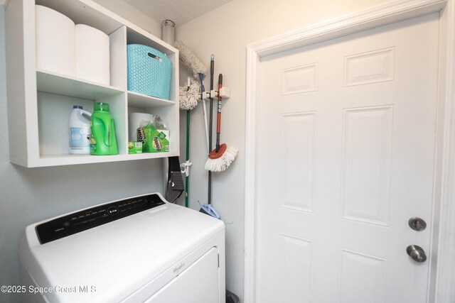3511 Constitution Dr, Titusville, FL 32780 - clothes washing area featuring washer / dryer