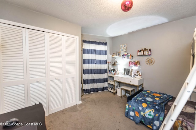 3511 Constitution Dr, Titusville, FL 32780 - bedroom featuring a closet, carpet, and a textured ceiling
