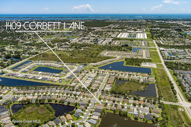 1409 Corbett Ln, Melbourne, FL 32904 - aerial overview of property's location featuring a nearby body of water and nearby suburban area