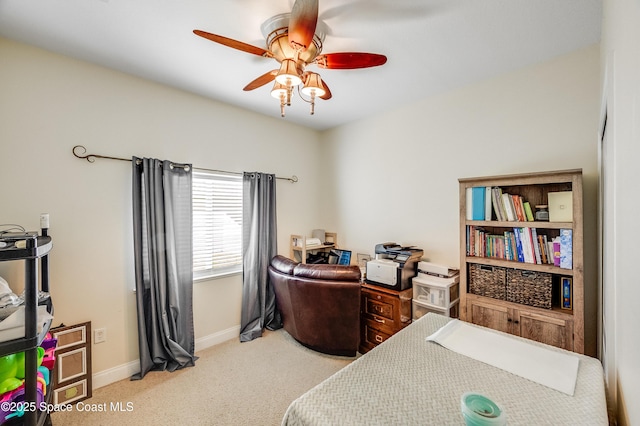1409 Corbett Ln, Melbourne, FL 32904 - carpeted bedroom with baseboards and a ceiling fan
