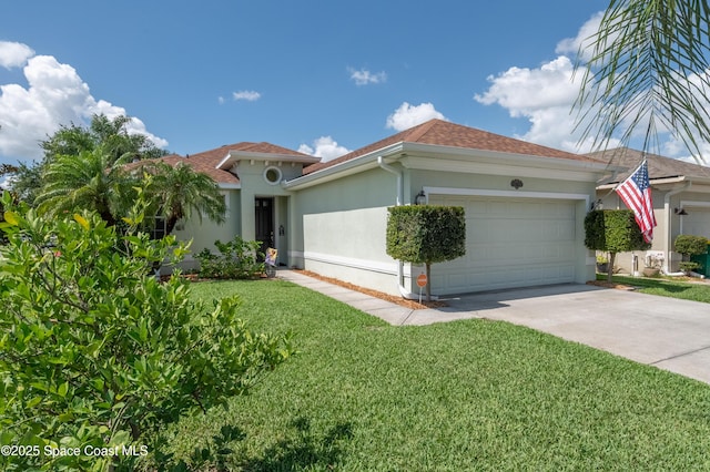 1409 Corbett Ln, Melbourne, FL 32904 - mediterranean / spanish house with stucco siding, an attached garage, a front lawn, concrete driveway, and roof with shingles