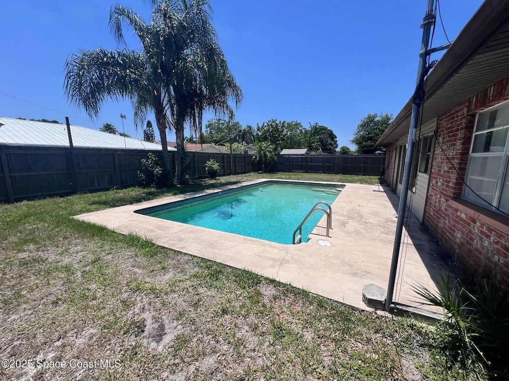 611 Tulane Ave, Melbourne, FL 32901 - view of swimming pool featuring a fenced backyard and a patio