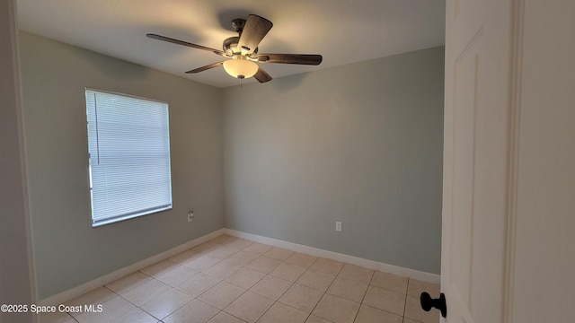 333 Galena St SW, Palm Bay, FL 32908 - unfurnished room featuring plenty of natural light, light tile patterned floors, a ceiling fan, and baseboards