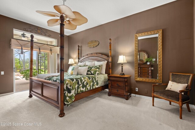 448 Birchington Ln, Melbourne, FL 32940 - carpeted bedroom featuring access to outside, baseboards, and a ceiling fan