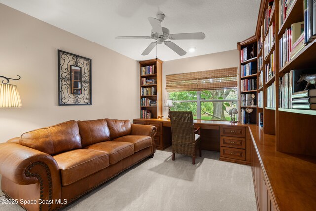 448 Birchington Ln, Melbourne, FL 32940 - home office featuring a ceiling fan and light carpet