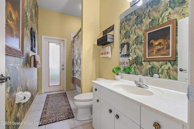 448 Birchington Ln, Melbourne, FL 32940 - bathroom featuring tile patterned flooring, toilet, and vanity