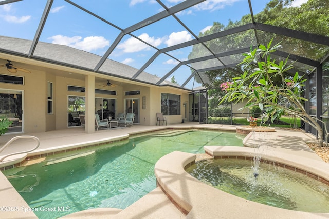 448 Birchington Ln, Melbourne, FL 32940 - view of swimming pool featuring ceiling fan, a pool with connected hot tub, a patio, and a lanai