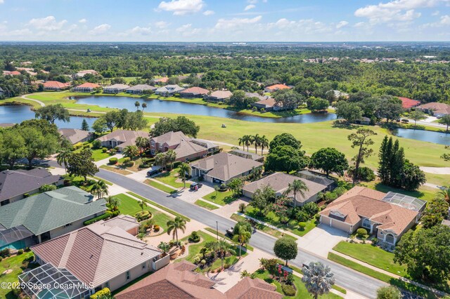 448 Birchington Ln, Melbourne, FL 32940 - aerial perspective of suburban area featuring a large body of water and a golf club