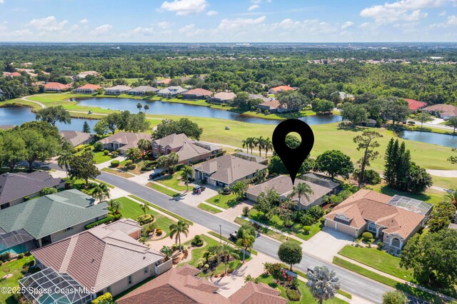 448 Birchington Ln, Melbourne, FL 32940 - aerial view of residential area featuring a nearby body of water and a golf club