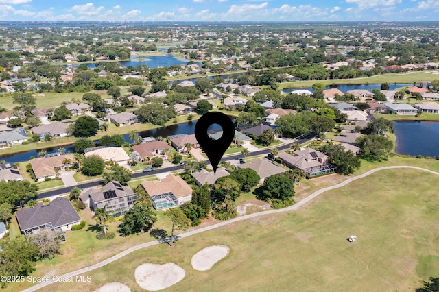 448 Birchington Ln, Melbourne, FL 32940 - aerial view of property and surrounding area featuring nearby suburban area, a large body of water, and a local golf course