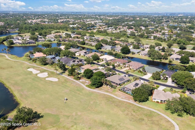 448 Birchington Ln, Melbourne, FL 32940 - aerial perspective of suburban area featuring a nearby body of water and a golf club