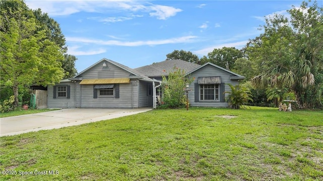 8516 99th Ct, Vero Beach, FL 32967 - view of front of property featuring a front yard and driveway