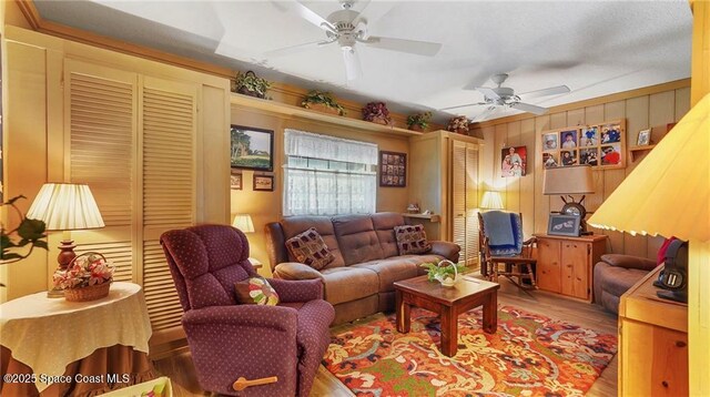 8516 99th Ct, Vero Beach, FL 32967 - living room with ceiling fan and wood finished floors