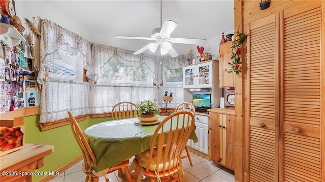 8516 99th Ct, Vero Beach, FL 32967 - dining room with light tile patterned floors and a ceiling fan