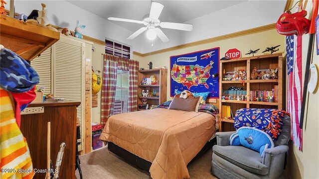 8516 99th Ct, Vero Beach, FL 32967 - bedroom with ceiling fan and ornamental molding