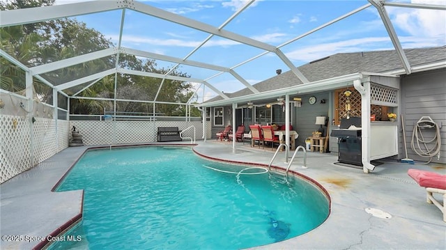 8516 99th Ct, Vero Beach, FL 32967 - view of pool with a patio area, ceiling fan, and glass enclosure