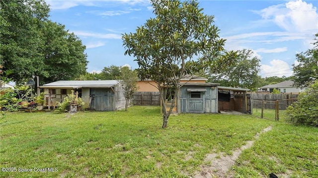 8516 99th Ct, Vero Beach, FL 32967 - view of yard featuring an outdoor structure