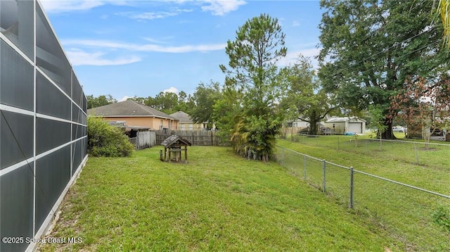 8516 99th Ct, Vero Beach, FL 32967 - view of yard with a lanai