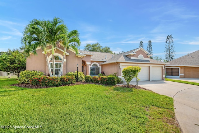 1197 Acappella Dr, Melbourne, FL 32940 - view of front facade with stucco siding, a garage, driveway, and a shingled roof