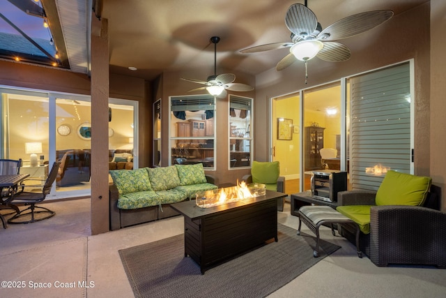 1197 Acappella Dr, Melbourne, FL 32940 - view of patio / terrace with ceiling fan and an outdoor living space with a fire pit