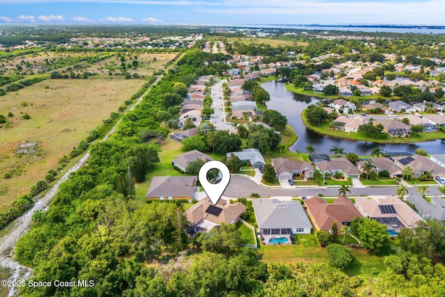 1197 Acappella Dr, Melbourne, FL 32940 - aerial view of property and surrounding area featuring nearby suburban area and a nearby body of water