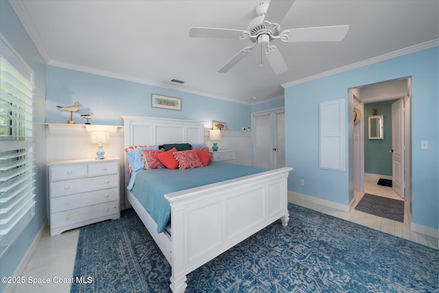 1951 W Sandpiper Rd, Vero Beach, FL 32963 - bedroom with crown molding, baseboards, and a ceiling fan