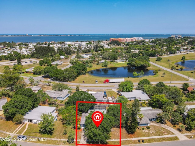 view of property location featuring a nearby body of water and property boundaries highlighted