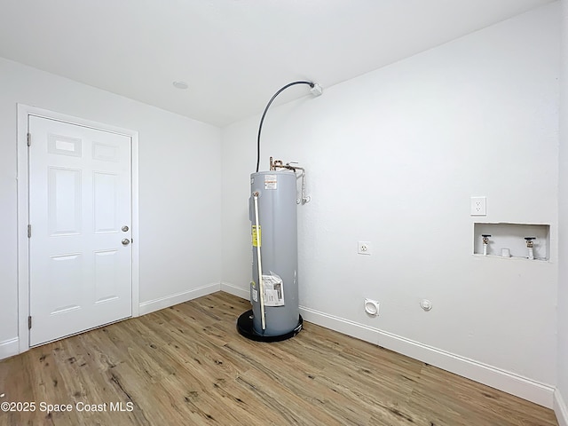 utility room with water heater
